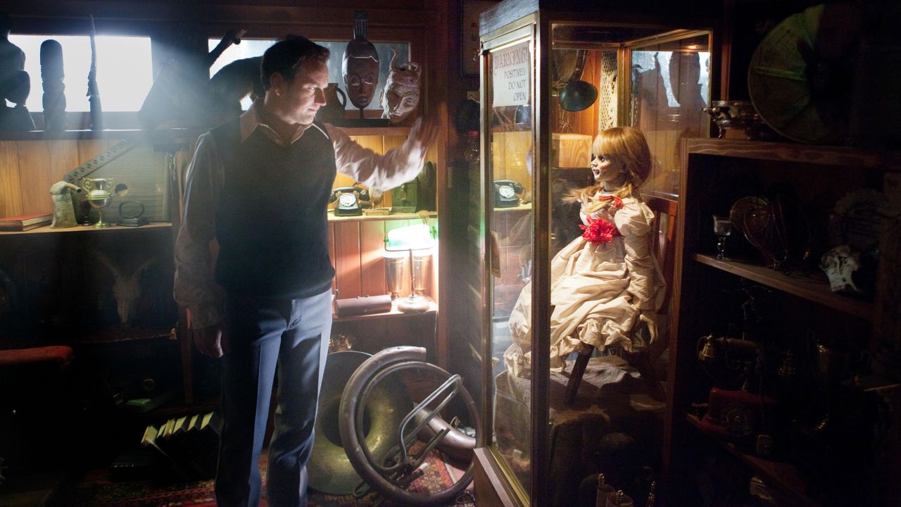Patrick Wilson (left) with Annabelle in "The Conjuring" (2013).