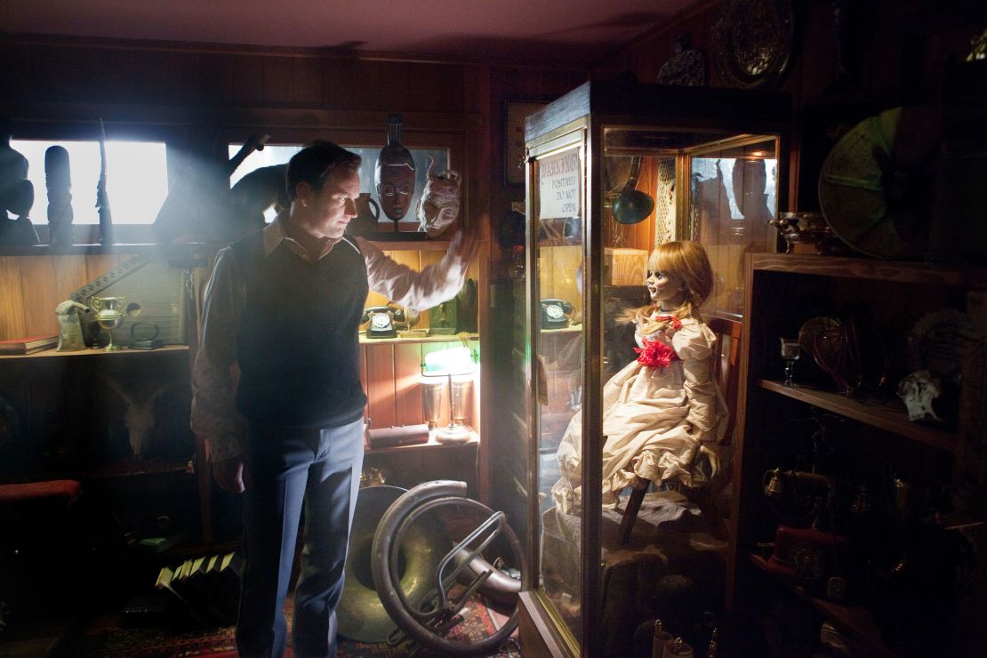 Patrick Wilson (left) with Annabelle in "The Conjuring" (2013).