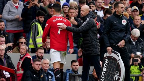Cristiano Ronaldo with manager Erik ten Hag after being substituted.