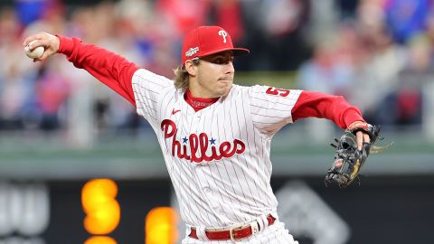 Bryson Stott of the Philadelphia Phillies throws out a runner at first base against the San Diego Padres in game four of the National League Championship Series at Citizens Bank Park on Saturday.