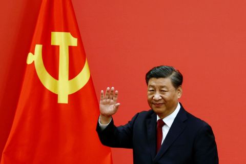 Xi Jinping waves after his speech following China's 20th Communist Party Congress at the Great Hall of the People in Beijing on Sunday, October 23.