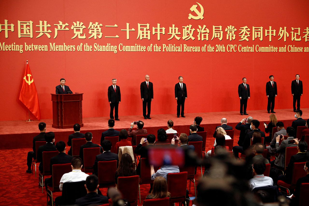 New members of the Politburo Standing Committee — China's top ruling body — are introduced at the Great Hall of the People on Sunday, October 23. Xi also revealed the full lineup of the 24-member Politburo, which for the first time in at least 25 years includes no women.