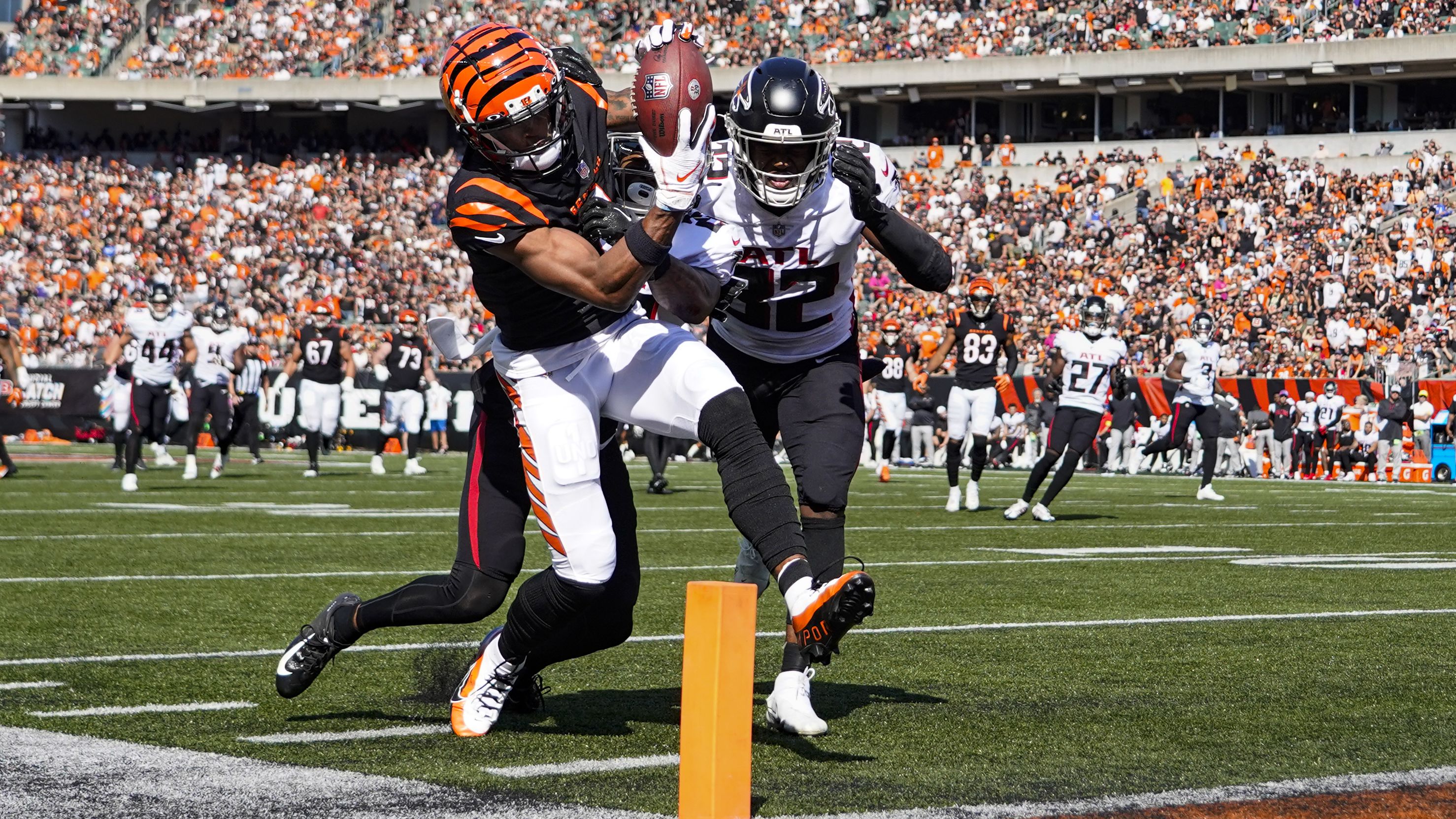 Cincinnati Bengals wide receiver Ja'Marr Chase catches one of his two touchdowns on the afternoon over Atlanta Falcons cornerback Cornell Armstrong and safety Jaylinn Hawkins. The Bengals beat the Falcons 35-17 behind a monster performance from quarterback Joe Burrow, who threw 34-for-42 for 481 yards and three touchdowns.