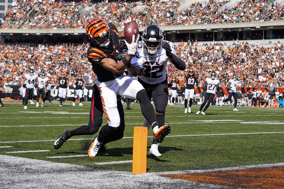 Cincinnati Bengals wide receiver Ja'Marr Chase catches one of his two touchdowns on the afternoon over Atlanta Falcons cornerback Cornell Armstrong and safety Jaylinn Hawkins. The Bengals beat the Falcons 35-17 behind a monster performance from quarterback Joe Burrow, who threw 34-for-42 for 481 yards and three touchdowns.