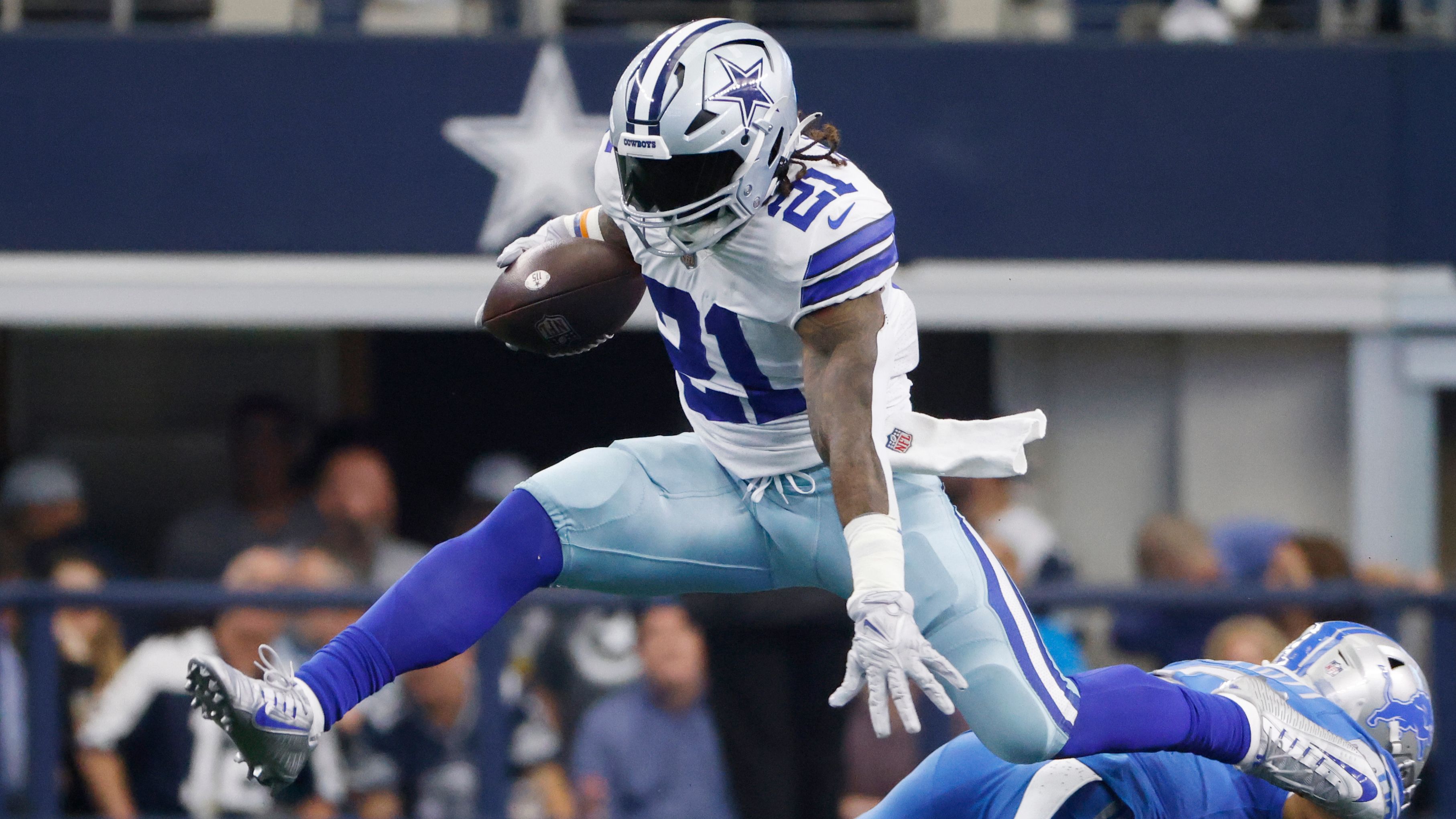 All eyes might have been focused on quarterback Dak Prescott's return but Dallas Cowboys running back Ezekiel Elliott — here hurdling Detroit Lions safety DeShon Elliott — stole the show with two rushing TDs to help America's Team to a 24-6 win over Detroit.