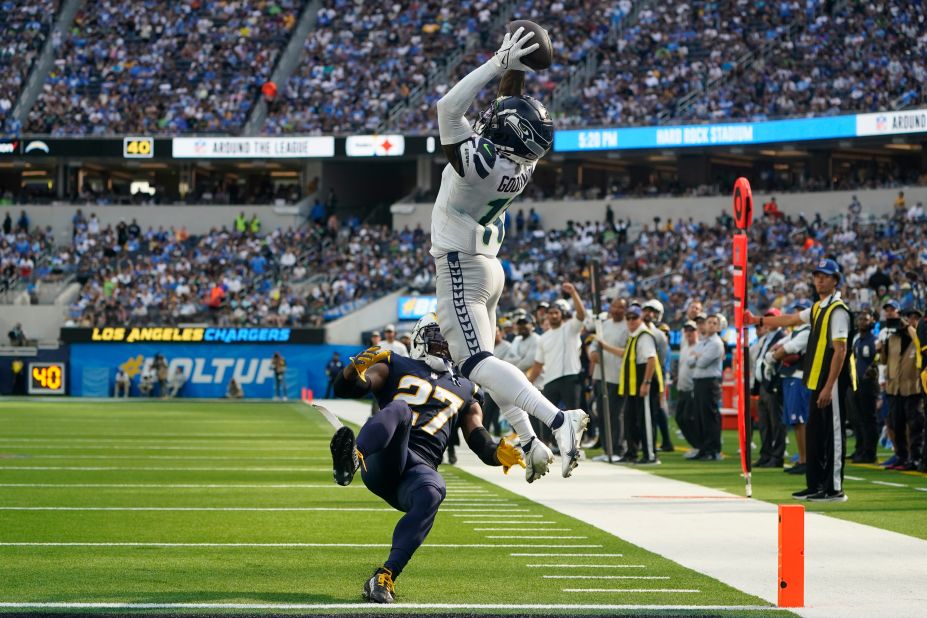 Seattle Seahawks receiver Marquise Goodwin makes an amazing catch for a touchdown in the first half of a 37-23 win against the Los Angeles Chargers on Sunday. Goodwin made four catches for 67 yards and two TDs on the day.