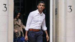 Conservative Party leadership candidate Rishi Sunak leaves his campaign office, in London, Sunday, Oct. 23, 2022. 