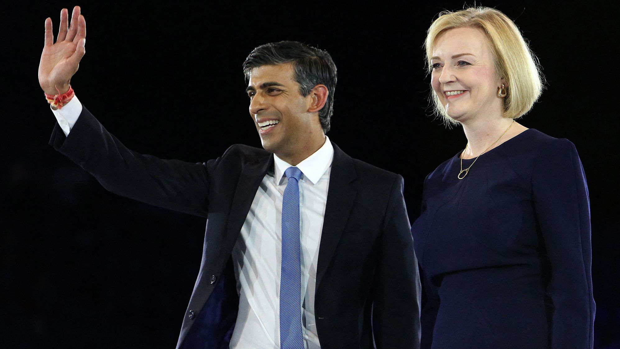 Sunak and Liz Truss stand together on stage during the final Conservative Party Hustings event in London in August 2022. At the time, they were the final two contenders to become the country's next Prime Minister. Truss defeated Sunak with 81,326 votes to 60,399 among party members. When she announced her resignation weeks later, he became the frontrunner to replace her.