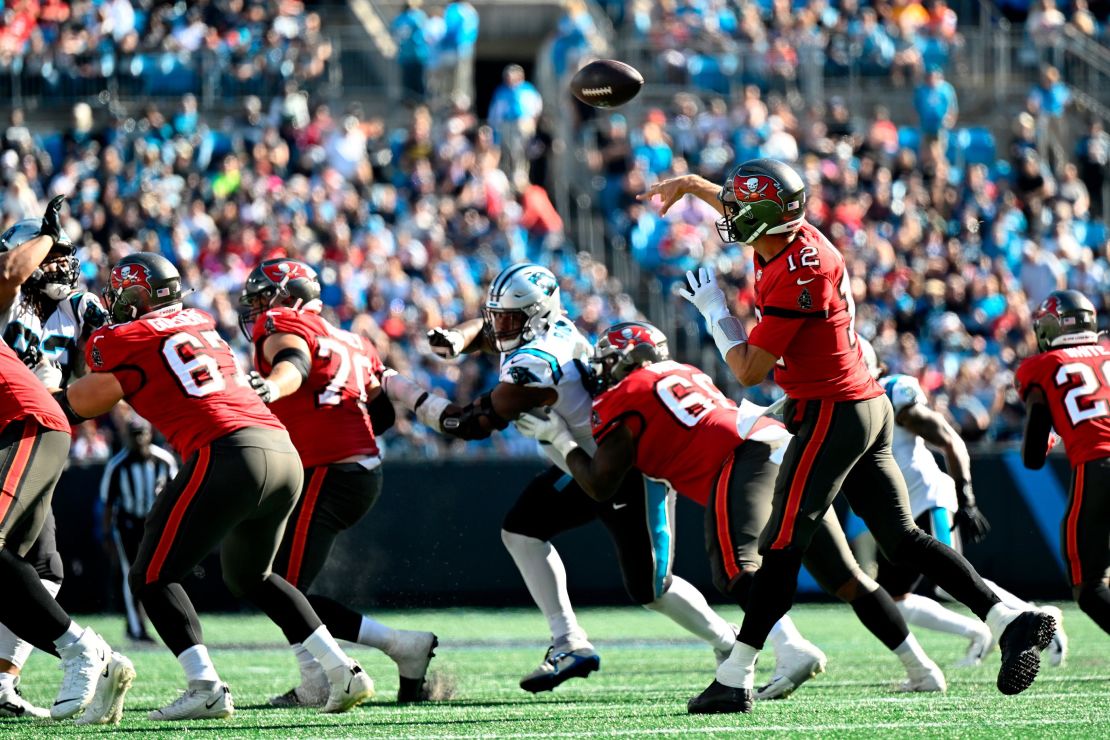 Brady passes the ball in the third quarter against the Panthers.