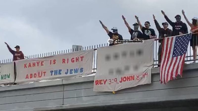 Los Angeles officials condemn demonstrators seen in photos showing support of Kanye West’s antisemitic remarks | CNN