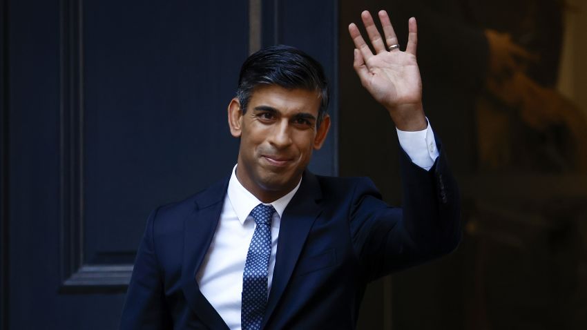 LONDON, ENGLAND - OCTOBER 24: New Conservative Party leader and incoming prime minister Rishi Sunak waves as he leaves Conservative Party Headquarters on October 24, 2022 in London, England.  Rishi Sunak has been appointed Conservative Party leader and the UK's next Prime Minister after he was the only candidate to win more than 100 votes from Conservative MPs in the race for the top spot. .  (Photo by Jeff J Mitchell / Getty Images)