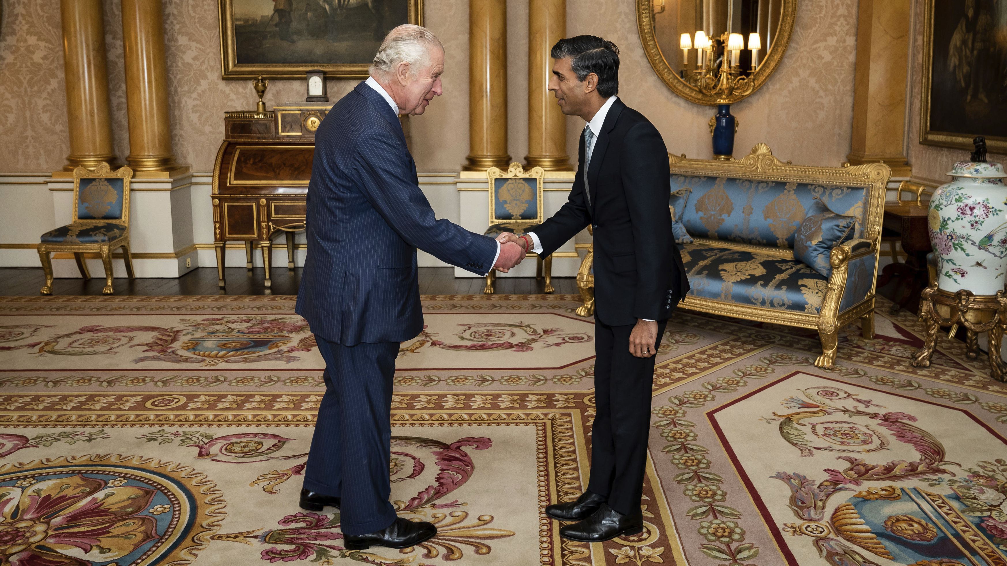 King Charles III welcomes Sunak during an audience at Buckingham Palace, where he invited the newly elected leader of the Conservative Party to become prime minister on October 25.