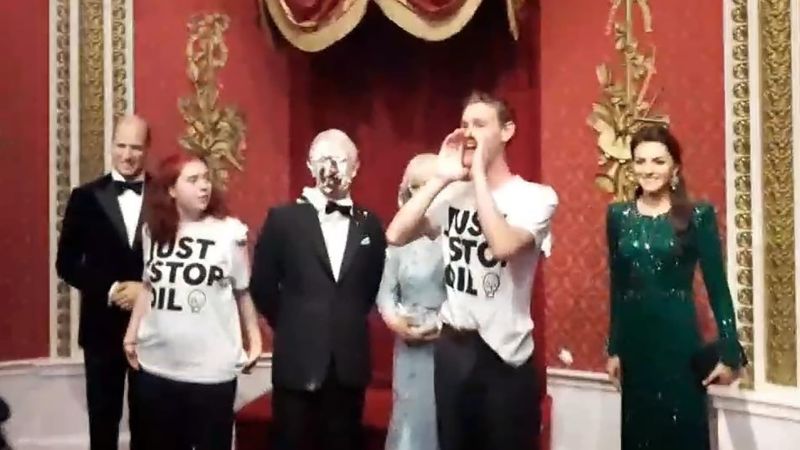 Watch: Activists deface King Charles III wax figure, Monet painting with cake and mash | CNN