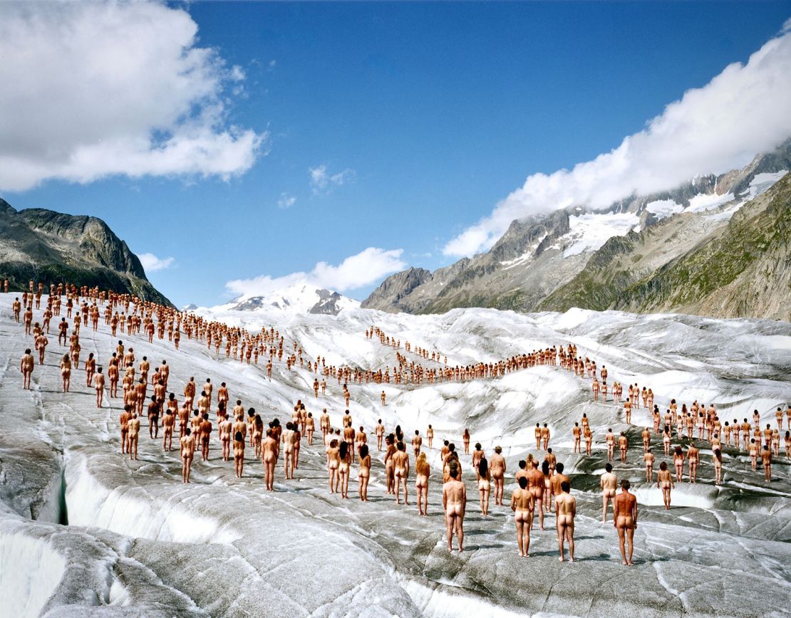 Volunteers pose for Tunick on a Swiss glacier.