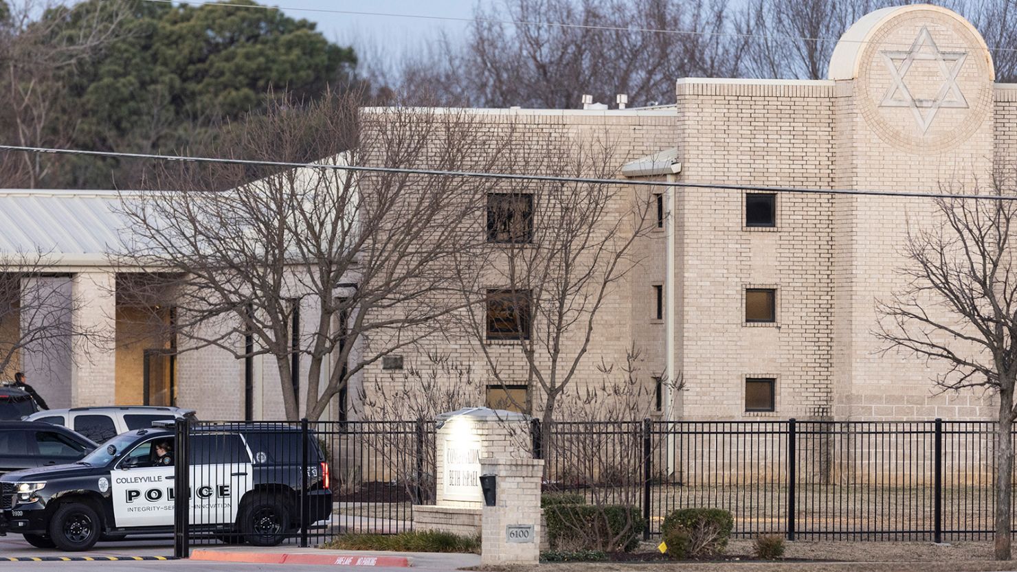 Police gather in front of the Congregation Beth Israel synagogue in Colleyville, Texas, in January. Four people were taken hostage by a pistol-wielding man during a Shabbat service