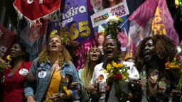 Women and candidates for the next general election protest against domestic violence, rape culture and femicide during the "March of Flowers" in Rio de Janeiro, Brazil, Wednesday, Sept. 21, 2022. 
