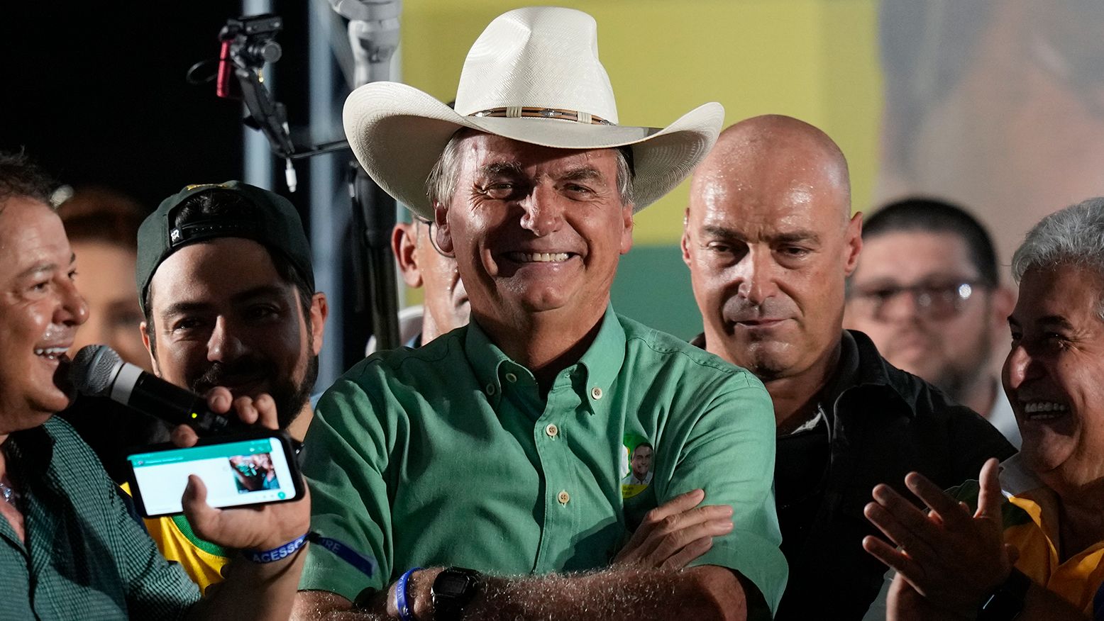 Brazil's President Jair Bolsonaro, who is running for a second term, smiles during a campaign rally in Guarulhos, the great Sao Paulo area, on October 22, 2022.