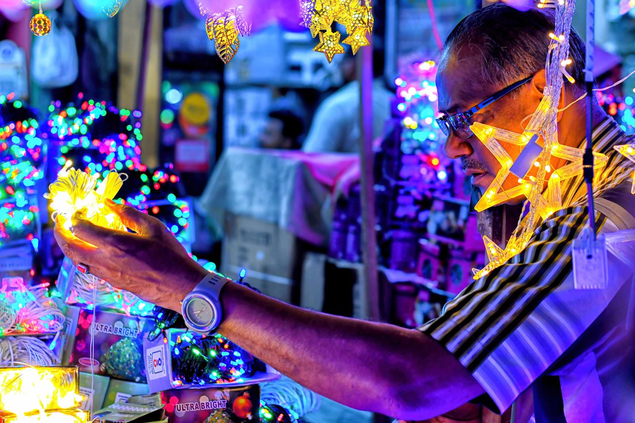 People in Kolkata, India, buy LED lights to decorate their homes for Diwali on Monday.