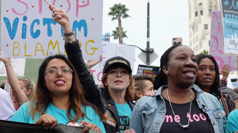 HOLLYWOOD, CA - NOVEMBER 12:  March organizer Brenda Gutierrez, actress Frances Fisher and activist and #MeToo campaign founder Tarana Burke participate in the Take Back The Workplace March and #MeToo Survivors March & Rally on November 12, 2017 in Hollywood, California.  (Photo by Sarah Morris/Getty Images)