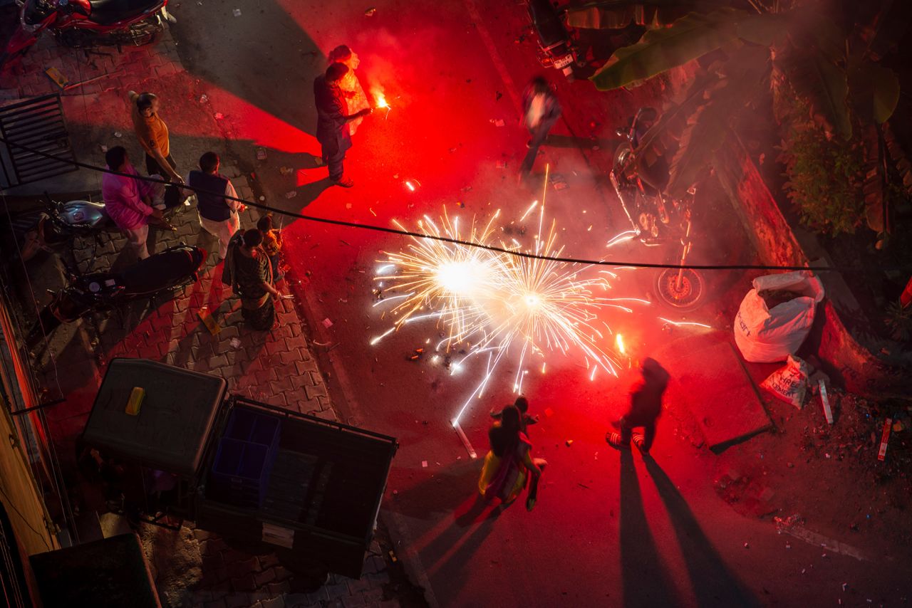 People light fireworks Monday in Ghaziabad, India.
