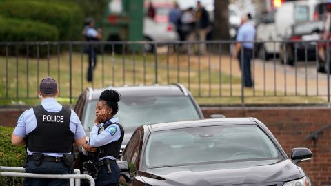 Law enforcement investigates the scene of a shooting Monday, Oct. 24, 2022, at Central Visual and Performing Arts High School in St. Louis. 