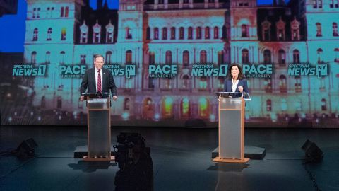 Republican Rep. Lee Zeldin, left, and Democratic Gov. Kathy Hochul meet for a debate hosted by Spectrum News NY1 and WNYC, on Tuesday, October 25, 2022, at Pace University.