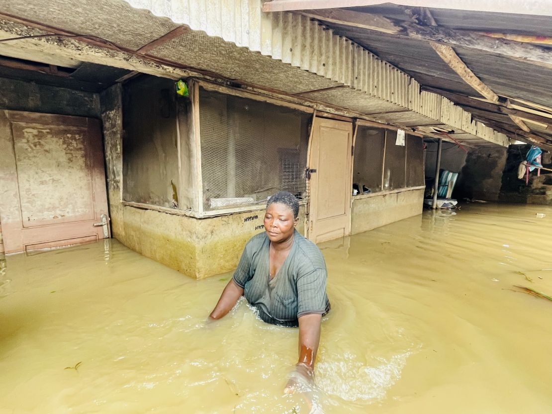 Flooding in Nigeria's Bayelsa state has forced people to wade through waiste-high water.