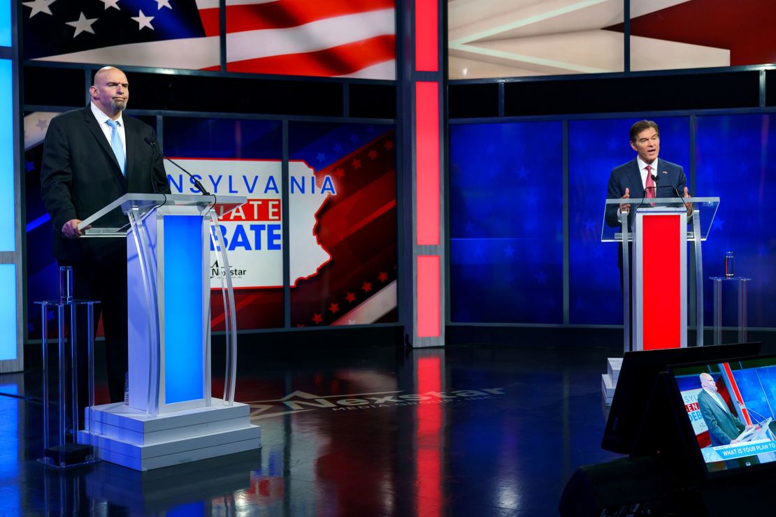 Lt. Gov. John Fetterman and Dr. Mehmet Oz debate on Tuesday in Harrisburg, Pa. 