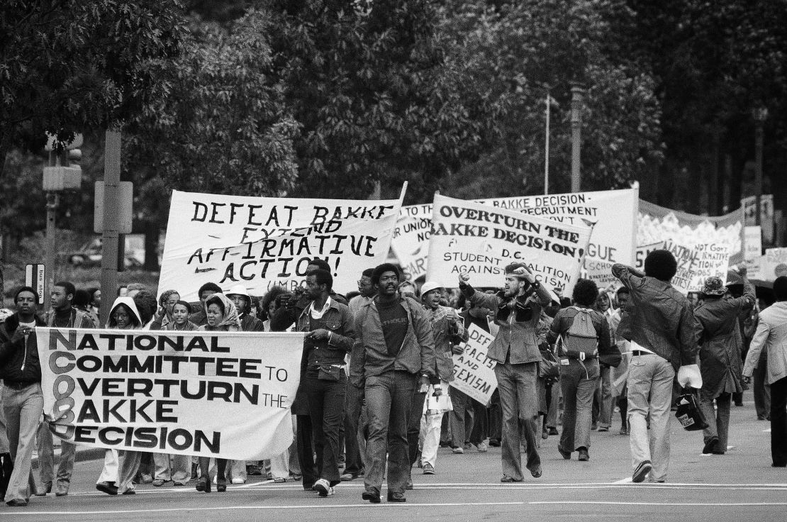 Demonstrators sponsored by the National Committee to Overturn the Bakke Decision march along Pennsylvania Avenue in Washington, Oct. 8, 1977. 