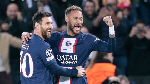 Messi and Neymar celebrate PSG's third goal in a dominant display against Israeli side Maccabi Haifa.