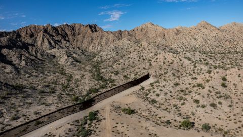 This aerial photograph taken from a CBP helicopter on September 28 shows the US-Mexico border fence stopping at a mountainside near Welton, Arizona.