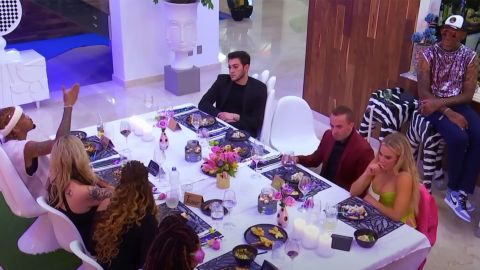 The new cast of "The Surreal Life" sit down for dinner -- and some heated conversation -- in a scene from the VH1 show.