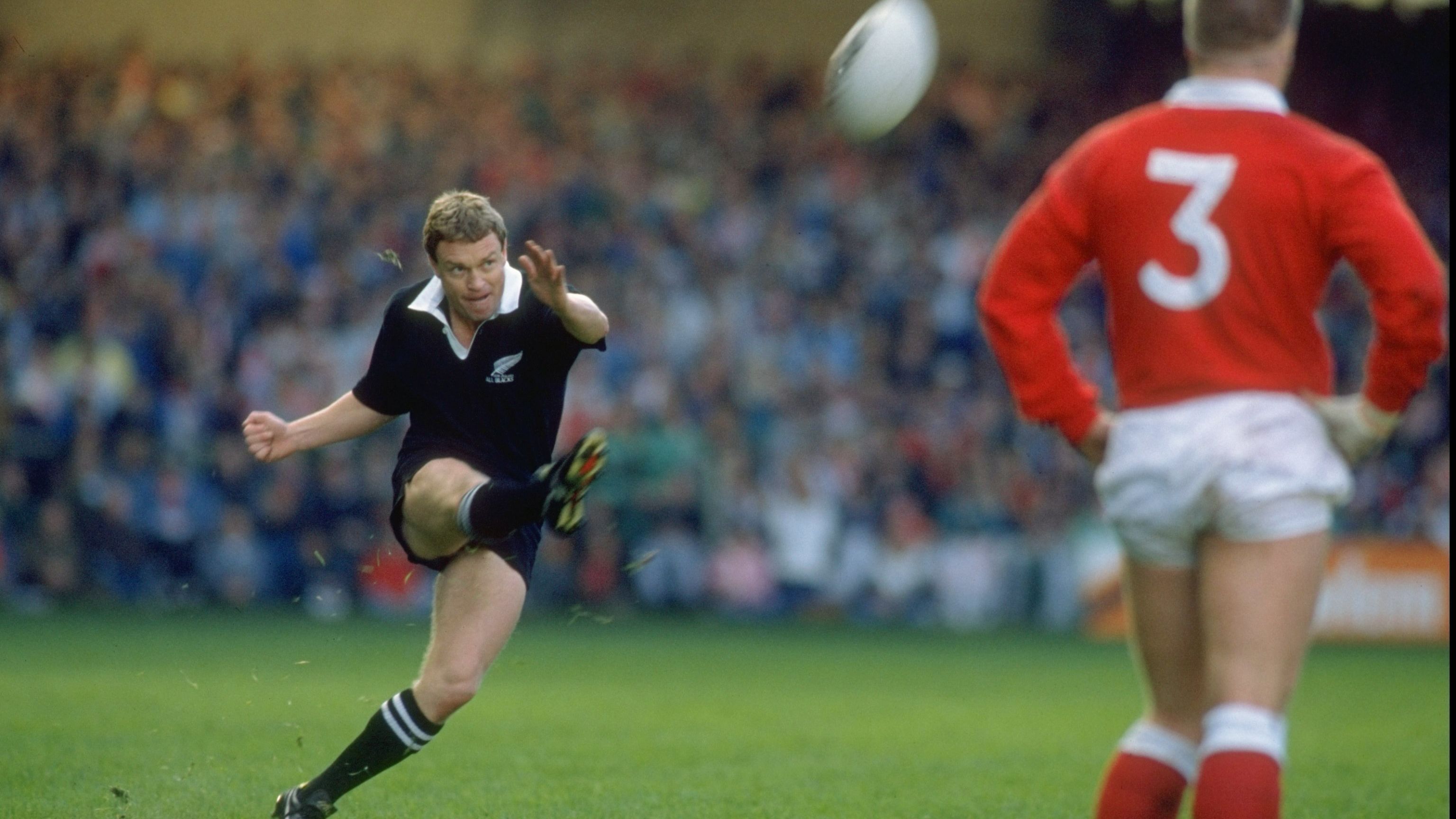 Grant Fox kicks during the All Blacks tour of Britain in 1989.