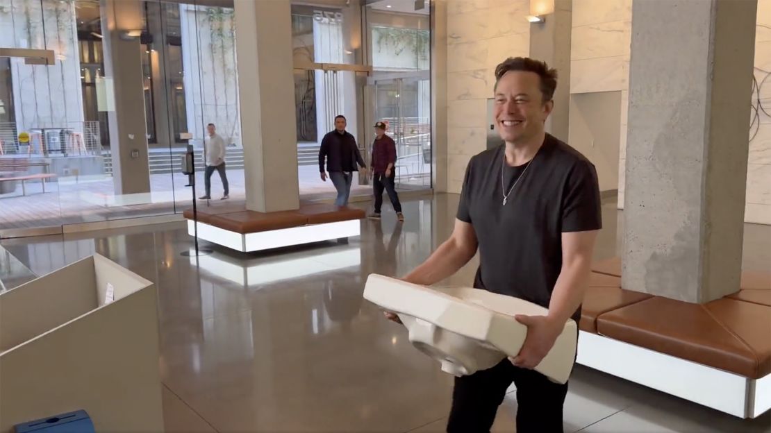 Elon Musk on Wednesday posted a video showing him entering Twitter's headquarters carrying a sink. His deal to buy the company is expected to close by Friday. 