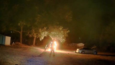 A motorcyclist erupts in flames after being tased by a Arkansas State Police trooper on October 13, 2022. 