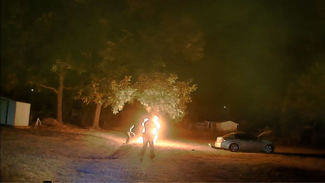 The motorcyclist is seen on fire after being tased by a Arkansas State Police trooper on October 13, 2022. 
