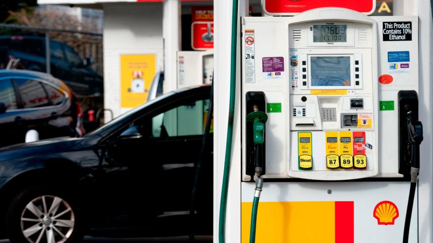 A vehicle sits near a gas pump at a Shell gas station in Washington, DC, on April 12, 2022. - Americans paid more for gasoline, food and other essentials last month amid an ongoing wave of record inflation made worse by Russia's invasion of Ukraine, according to government data released Tuesday. (Photo by Stefani Reynolds / AFP) (Photo by STEFANI REYNOLDS/AFP via Getty Images)