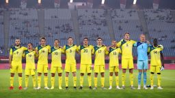 Players of Team Australia stand for the national anthem prior to the Mens Group C match between Australia and Egypt on day five of the Tokyo 2020 Olympic Games at Miyagi Stadium on July 28 2021 in Rifu Miyagi Japan