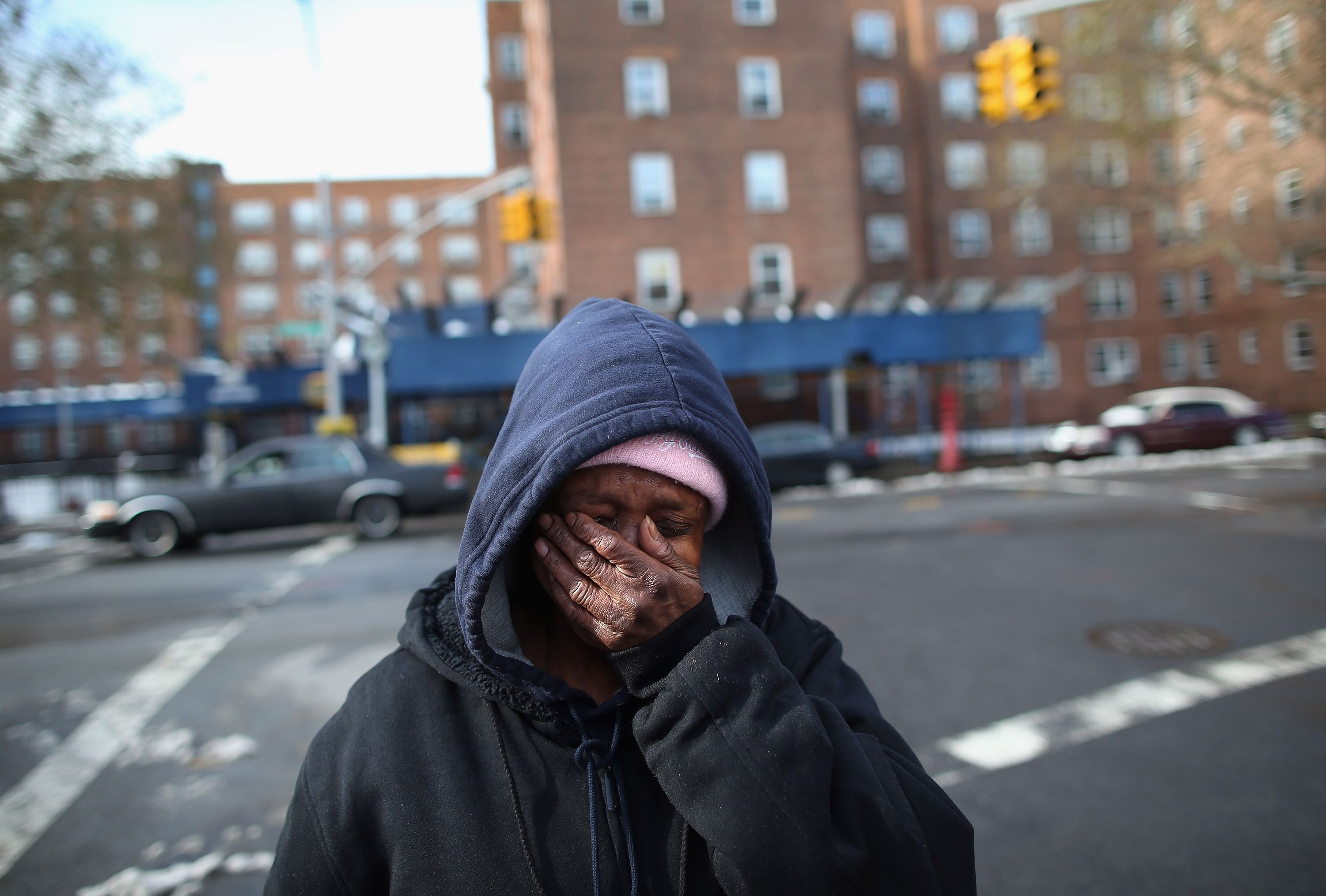 Theresa Goddard is overwhelmed while discussing her living conditions in Brooklyn, New York, on November 8, 2012.