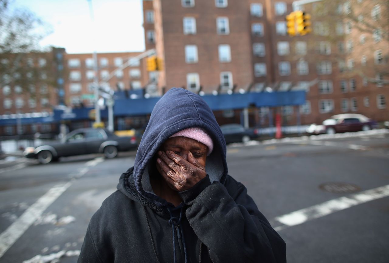 Theresa Goddard is overwhelmed while discussing her living conditions in Brooklyn, New York, on November 8, 2012. She and many other residents of the Red Hook public housing projects remained without electricity, heat and running water.