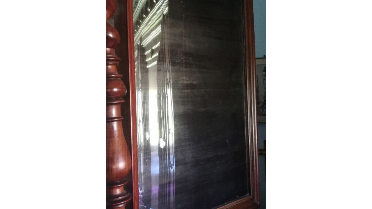 The owners of the villa claim the dark shadow of Mussolini's face appears in this vanity table mirror.