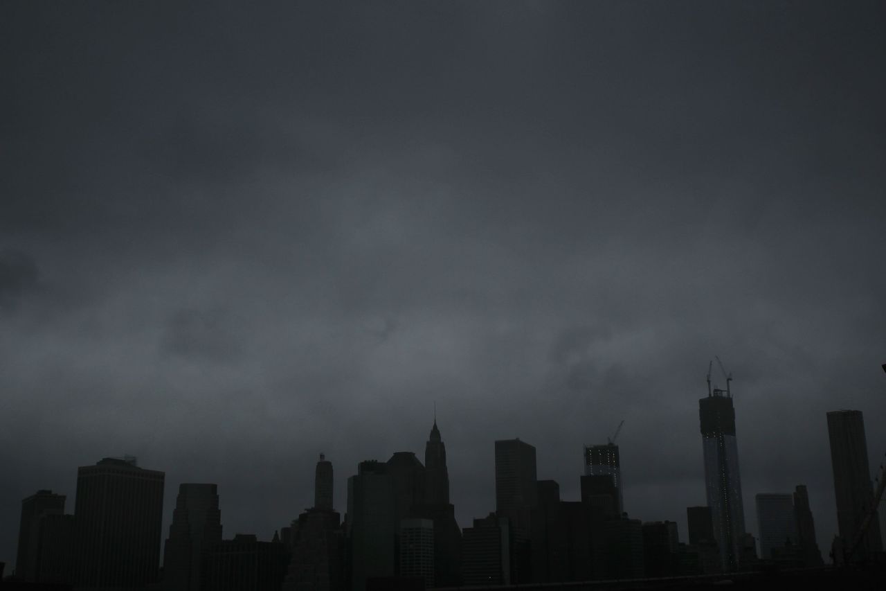 Dark clouds are seen over the Manhattan skyline on October 29, 2012.