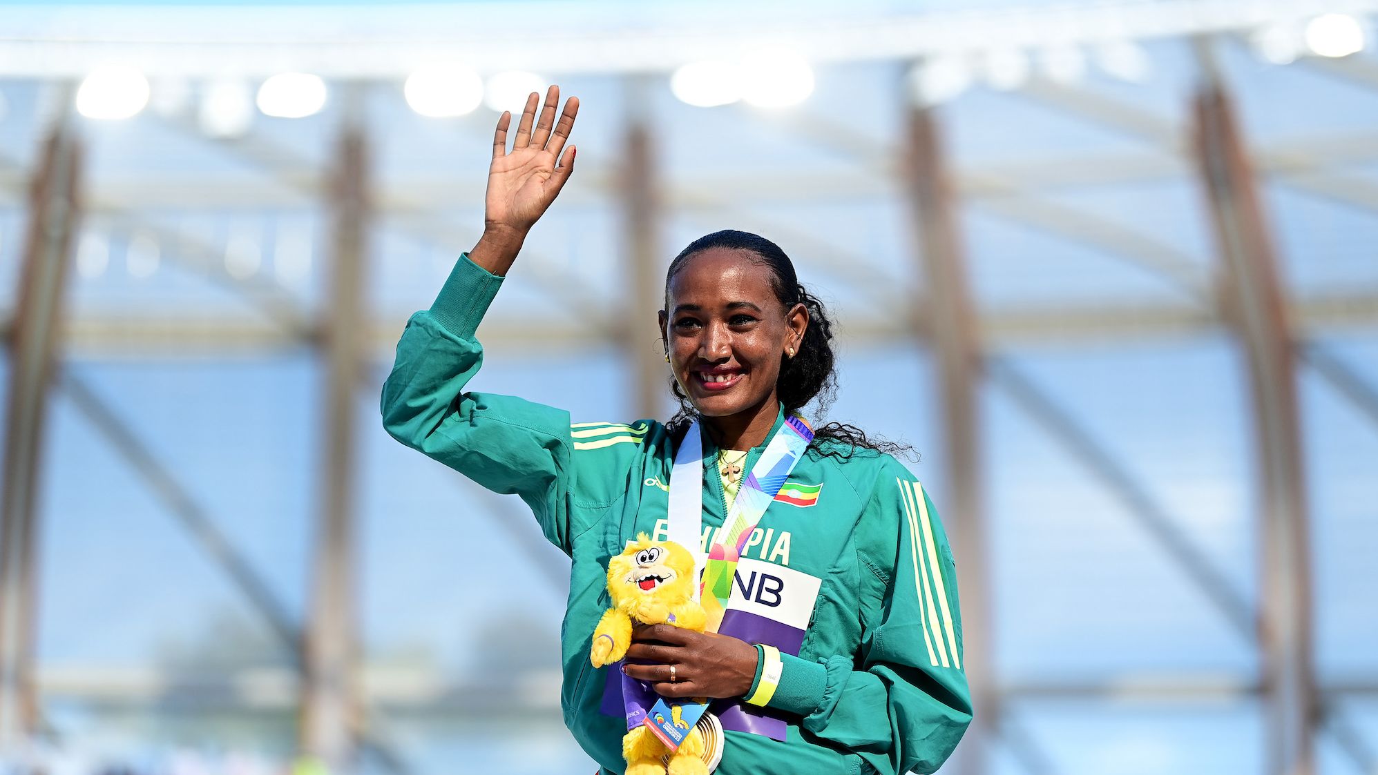 Gebreslase receives her gold medal in the women's marathon at the World Athletics Championships in Eugene, Oregon. 