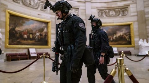 In this Jan. 6, 2021, file photo, members of the U.S. Secret Service Counter Assault Team walk through the Rotunda as they and other federal police forces responded as violent protesters loyal to then-President Donald Trump stormed the U.S. Capitol in Washington.