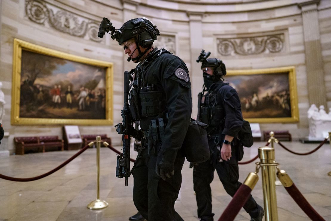 In this Jan. 6, 2021, file photo, members of the U.S. Secret Service Counter Assault Team walk through the Rotunda as they and other federal police forces responded as violent protesters loyal to then-President Donald Trump stormed the U.S. Capitol.