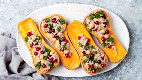 Help decolonize your menu by serving stuffed butternut squash with chickpeas, cranberries and quinoa. 
