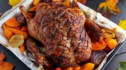 Duck roast with baked vegetables, autumn theme meal.