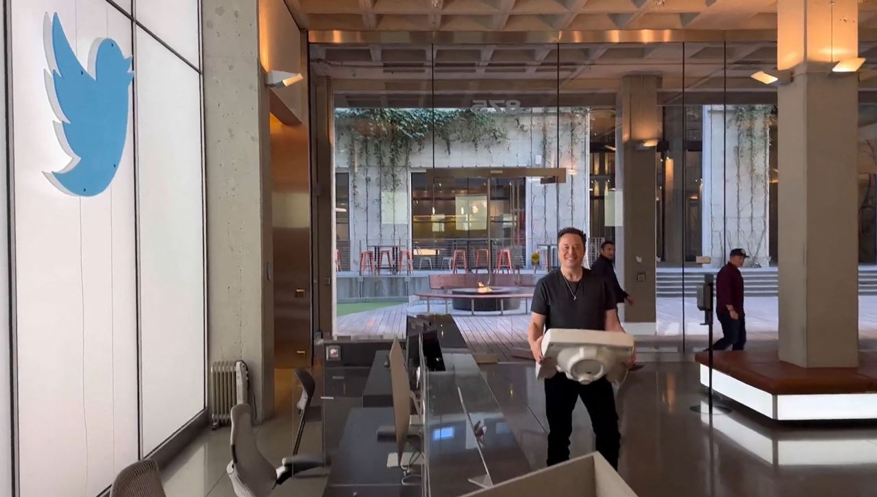 This image, taken from a video posted on the Twitter account of billionaire <a href="http://www.cnn.com/2020/05/13/us/gallery/elon-musk/index.html" target="_blank">Elon Musk</a>, shows Musk <a href="https://www.cnn.com/2022/10/26/tech/elon-musk-twitter-visit/index.html" target="_blank">carrying a sink</a> as he enters Twitter's headquarters in San Francisco on Wednesday, October 26. He wrote, "Entering Twitter HQ -- let that sink in!" <a href="https://www.cnn.com/2022/10/27/tech/elon-musk-twitter" target="_blank">He eventually completed his $44 billion deal to buy Twitter</a>, a source familiar with the deal told CNN on Thursday, putting the world's richest man in charge of one of the world's most influential social media platforms.