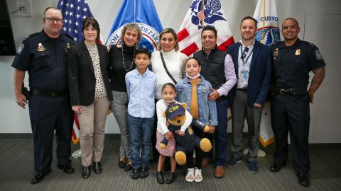 Officer J. Lott and his wife met with baby Alexa Garcia and her family at the San Ysidro Port of Entry to exchange gifts.