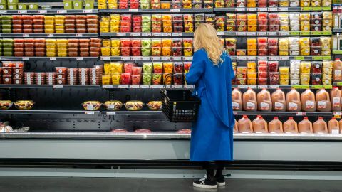 A shopper browsing in a Whole Foods supermarket in New York. 
